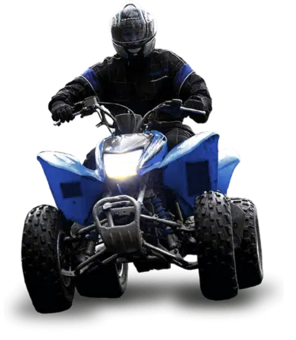 Person riding blue ATV in motion
