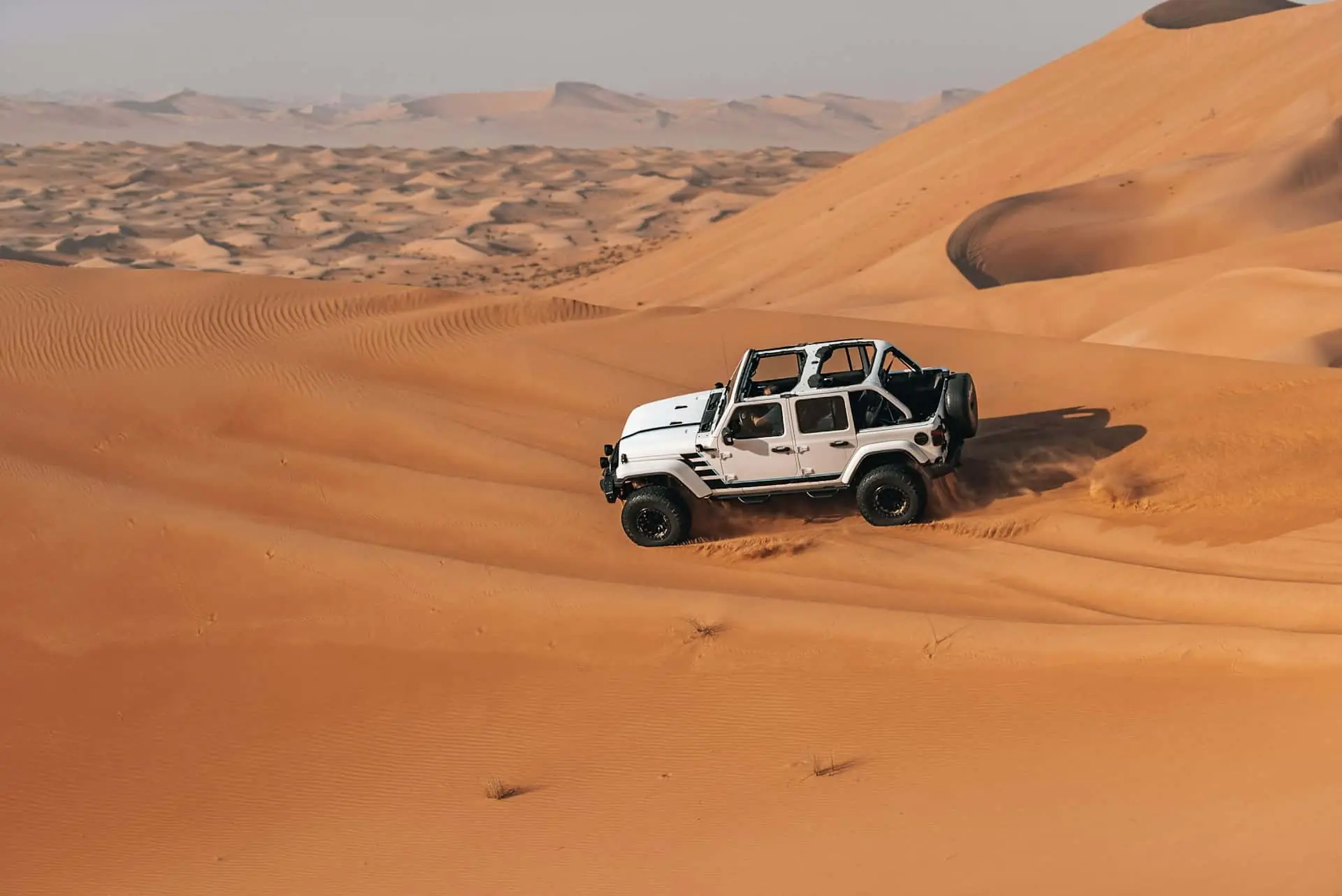 Crystal clear desert sky over Lahbab red dunes in Dubai winter season