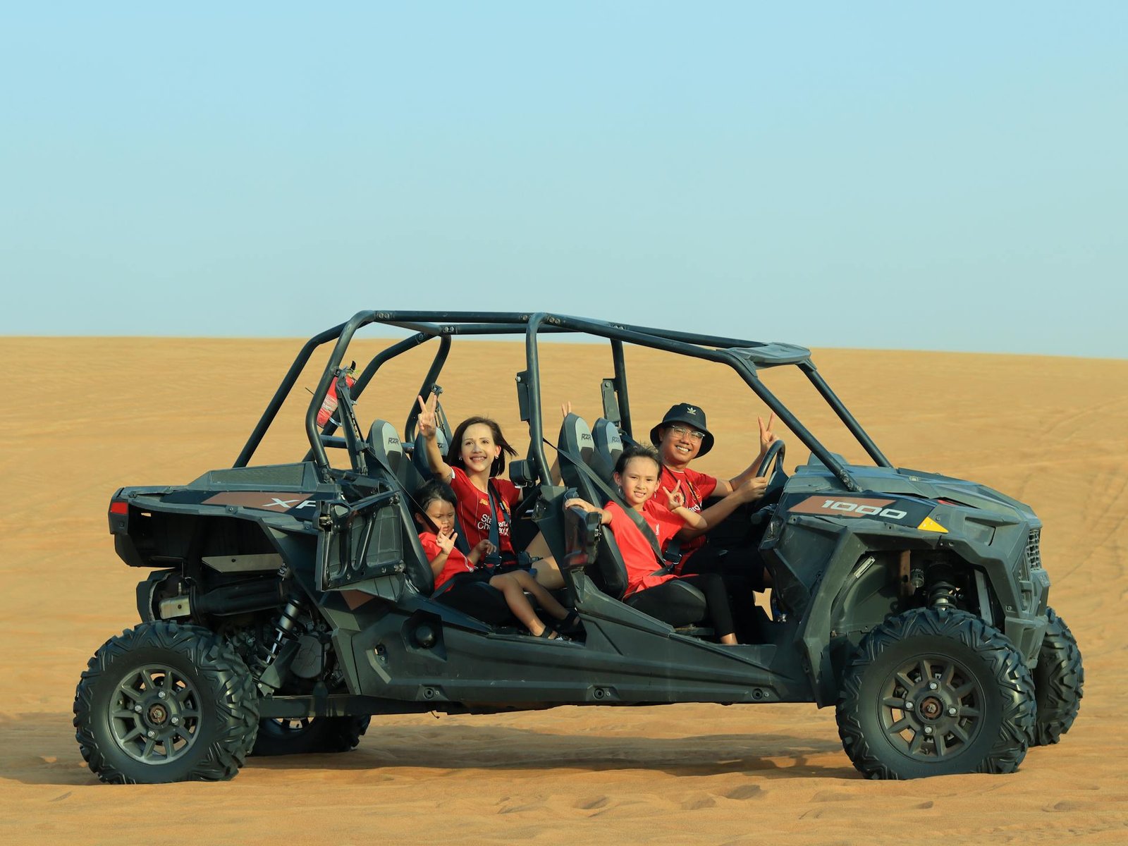 Morning Dune Buggy Dubai ride at sunrise with cool desert air and empty red dunes