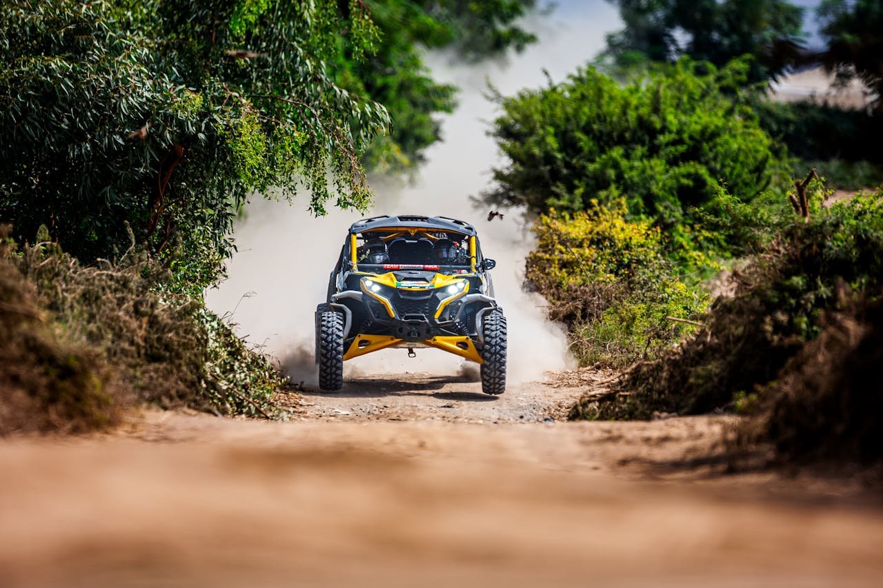 Friends enjoying a Can-Am Maverick X3 dune buggy ride in Dubai