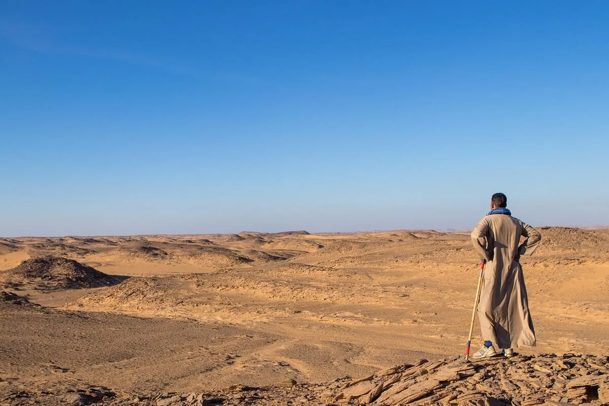 Dubai desert dune buggy safety tip showing importance of hydration during adventure